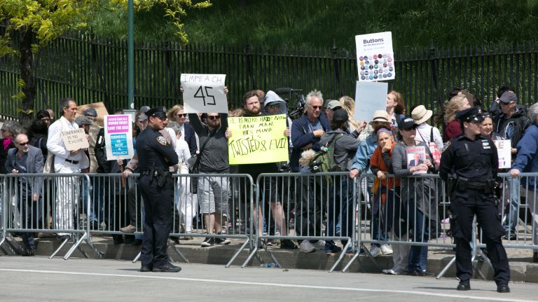 Protesters in De Witt Clinton Park before the president's visit to the Intrepid Air and Space Museum, on May 4, 2017.