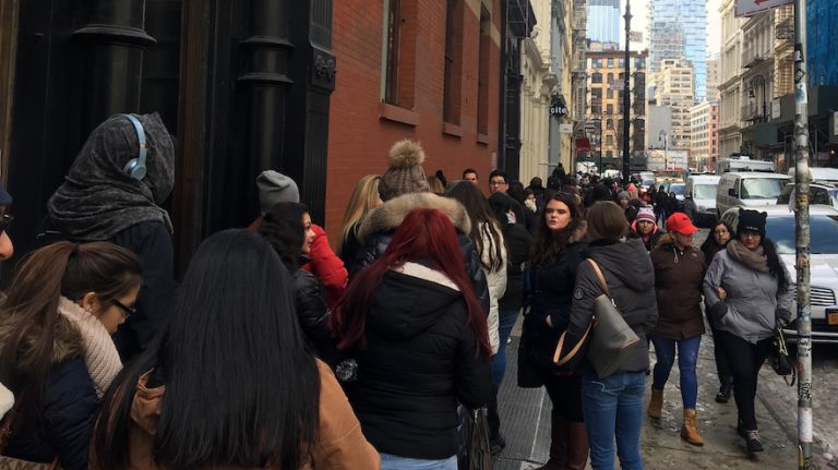 Kylie fans patiently wait toward the end of the line on Greene Street for entrance into the pop-up. 