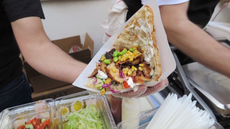 Invented in Berlin with roots in Turkey, the kotti sandwich is the specialty here. Marinated chicken is roasted on a Turkish vertical grill, then served on a variety of breads with roasted vegetables, tomatoes, cucumbers and a choice of sauces and condiments. Also available as a salad.