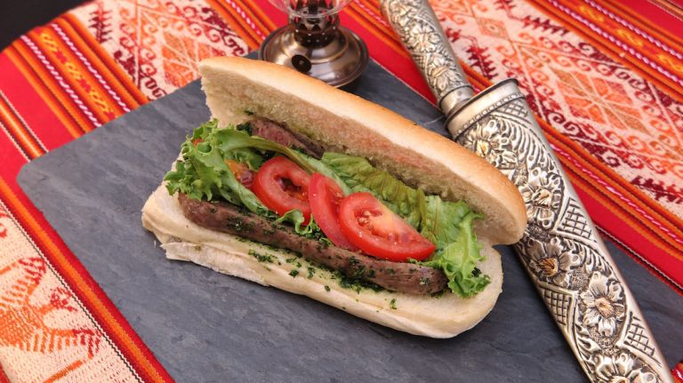 The classic Argentine sandwich, with sausage made of beef and pork, chimichurri, tomato, lettuce and mayo, is made by two friends from Brazil with a family recipe from Cordoba. 