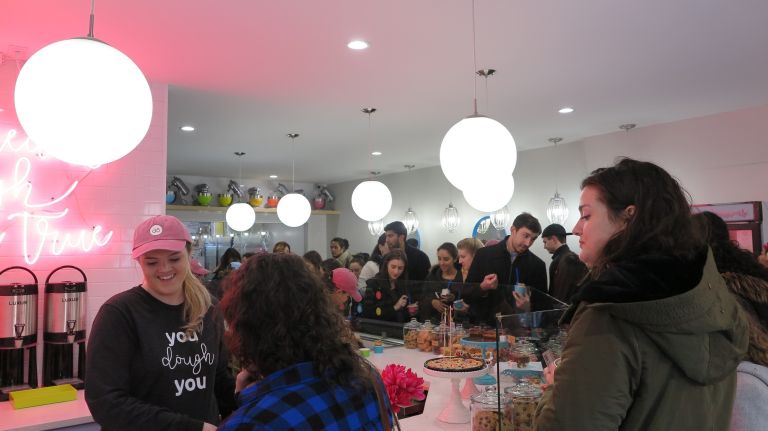 Patrons lined up to get a taste of the dough on the shop's first day in business.