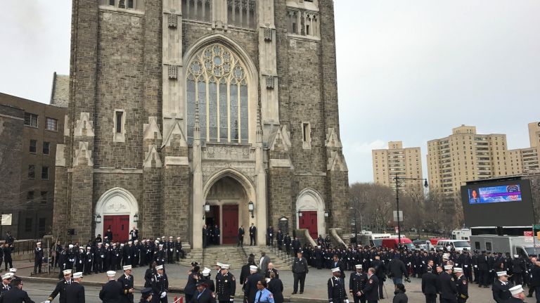 Mourners gather Saturday, March 25, 2017, for the funeral of slain FDNY EMT Yadira Arroyo in St. Nicholas of Tolentine Roman Catholic Church on University Avenue in the Bronx.