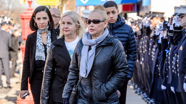 Family members leave the wake for Yadira Arroyo in the Joseph A. Lucchese Funeral Home on Morris Park Avenue in the Bronx, Thursday, March 23, 2017.