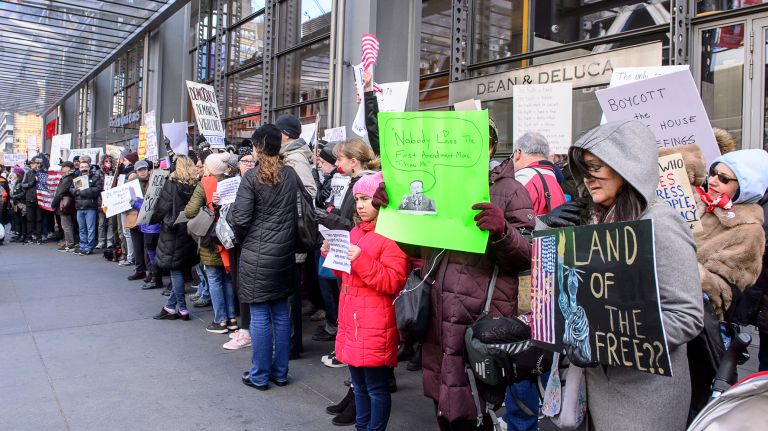 Protesters line the sidewalk outside the New York Times building in midtown Manhattan for the March for a Free Press on Feb. 26, 2017.