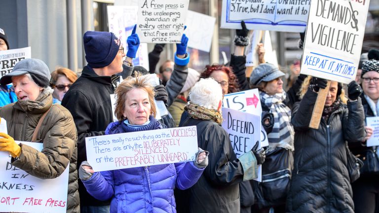 Protesters gather outside the New York Times building in midtown Manhattan for the March for a Free Press on Feb. 26, 2017.