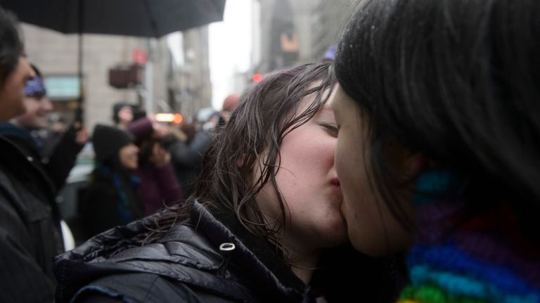 LGBT rally at Trump Tower: Photos of the midtown Manhattan protest 26 Members of the LGBT community and their allies make out on Fifth Avenue near Trump Tower in Manhattan on Sunday, Feb. 12, 2017. The lesbian, gay, bisexual and transgender community is concerned that gains made during the Obama administration will be rolled back by President Donald Trump.