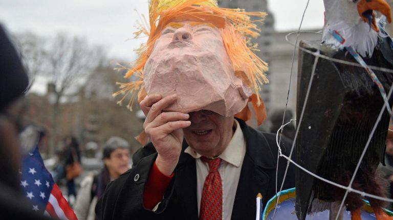 Manhattan resident Elliot Crown dressed as President Trump at a Washington Square Park rally on Saturday, Feb. 11, 2017. The rally is being held to challenge the criminalization of immigrants under the NYPD's current Broken Windows policy, before it worsens under Trump's far-right administration.