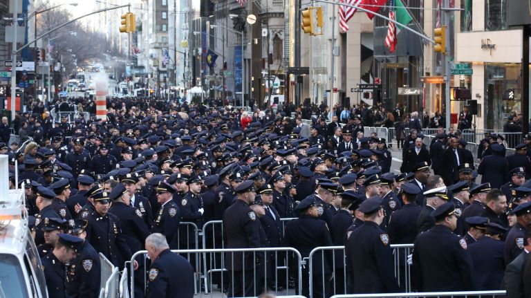 Police officers fill Fifth Avenue near St. Patrick's Cathedral prior to the funeral for NYPD Det. Steven McDonald on Friday, Jan. 13, 2017.