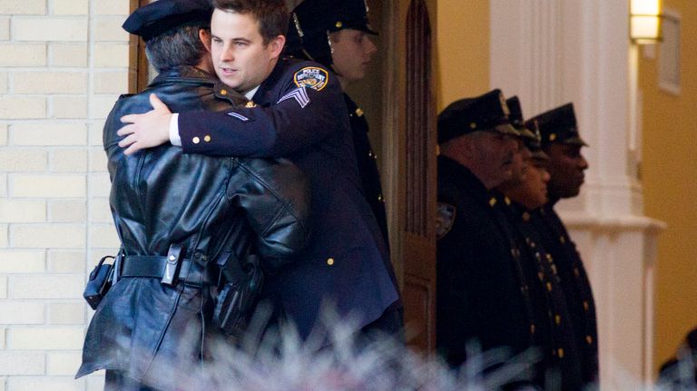 Sgt. Conor McDonald leaves the Parish Center at St. Agnes Cathedral prior to the coffin of his father Det. Steven McDonald on Friday, Jan. 13, 2017 in Rockville Centre.