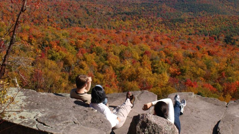 With nearly 100 peaks over 3,000 feet, the Catskills are true mountains. Just about everywhere you go in the sparsely populated four-county area -- especially the 287,500-acre Catskill Forest Preserve -- yields a collage of yellows, oranges and reds. For continuous scenic views, it's hard to beat a trip to Giant Ledge and Panther Mountain. Autumn colors peak late September into early October.