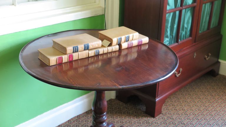 Though the bookcases in the office are replicas of what Hamilton used at the time, the office does offer some original artifacts in the form of five books from his personal library. The books have Hamilton's wife Elizabeth's signature inside.