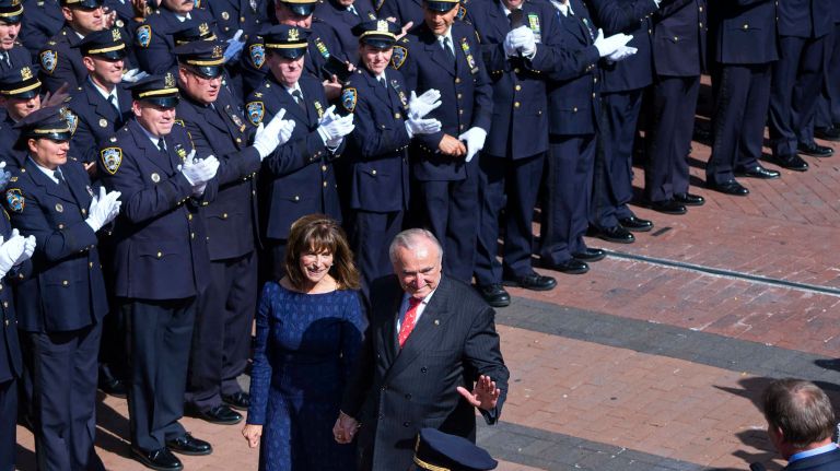Former NYPD Commissioner William Bratton leaves One Police Plaza in Manhattan with his wife Rikki Klieman, Friday, Sept. 16, 2016, signaling his official retirement from the department.