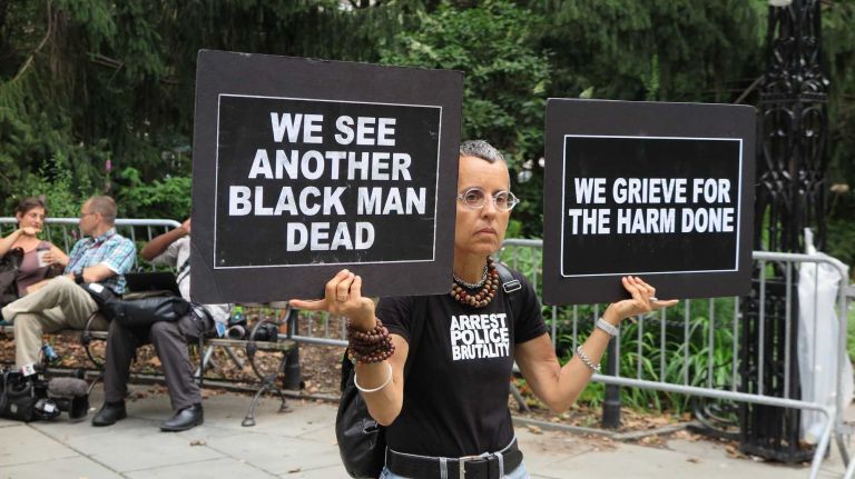 Protesters denounced police brutality at the gathering in City Hall Park on Aug. 1, 2016.