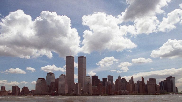 The lower Manhattan skyline on a partly cloudy day as seen from the Hudson River on June 6, 1991.
