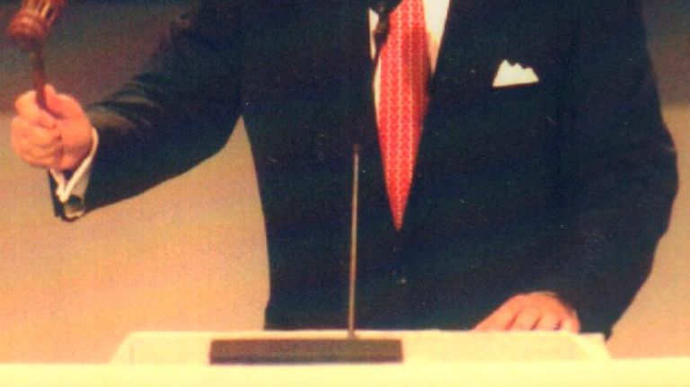 Democratic National Committee chairman Ron Brown, who grew up in Harlem, bangs the gavel to begin the convention at Madison Square Garden on July 13, 1992.