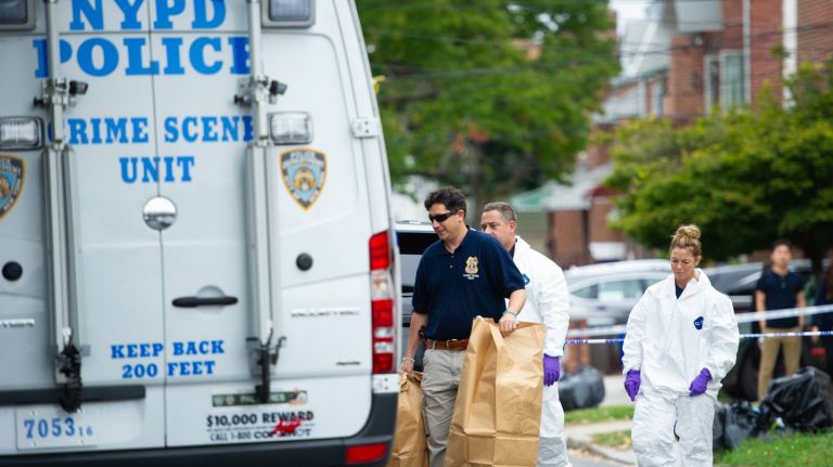 A woman stabbed three infants and two adults inside a Queens maternity center Friday morning, police said.