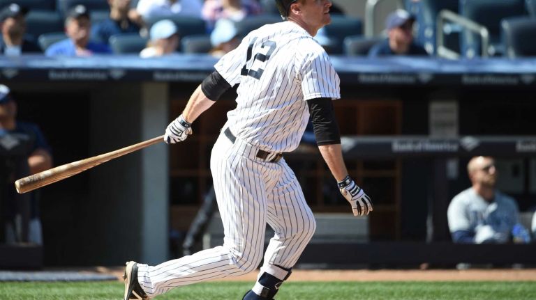 Yankees vs. Rays 57 New York Yankees third baseman Chase Headley flies out to center against the Tampa Bay Rays during the sixth inning of an MLB baseball game at Yankee Stadium on Sunday, April 24, 2016.