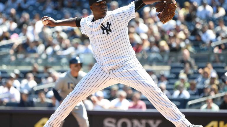 Yankees vs. Rays 64 New York Yankees starting pitcher Michael Pineda delivers a pitch against the Tampa Bay Rays during the first inning of an MLB baseball game at Yankee Stadium on Sunday, April 24, 2016.