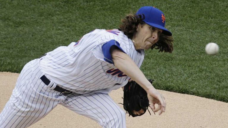 New York Mets starting pitcher Jacob deGrom (48) delivers a pitch in the first inning during the Mets' home opener against the Philadelphia Phillies on Friday, April 8, 2016 at Citi Field.