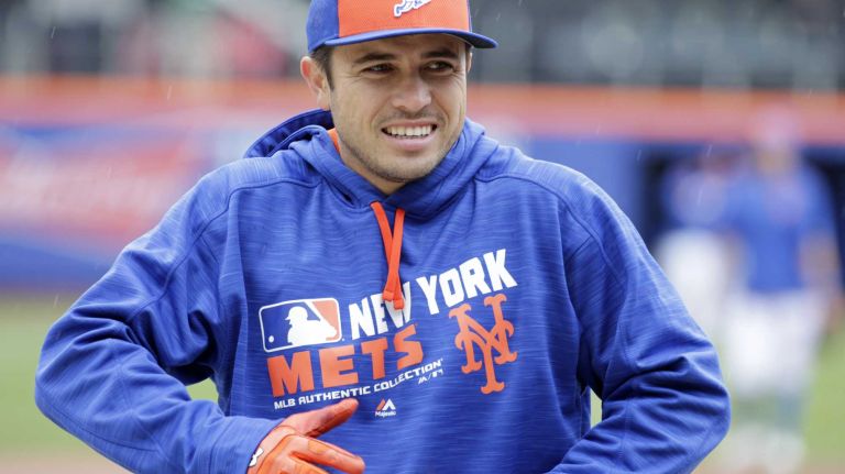 New York Mets catcher Travis d'Arnaud, No. 7, during batting practice before the Mets' home opener against the Philadelphia Phillies on Friday, April 8, 2016, at Citi Field.