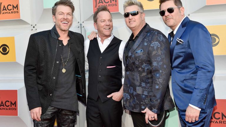 Actor/singer Kiefer Sutherland, second from left, with, from left, recording artists Joe Don Rooney, Gary LeVox and Jay DeMarcus of Rascal Flatts attend the 51st Academy of Country Music Awards at MGM Grand Garden Arena on April 3, 2016 in Las Vegas.