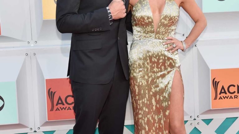 Academy of Country Music Awards co-host Luke Bryan and his wife, Caroline Boyer, arrive for the ceremony at MGM Grand Garden Arena in Las Vegas on Sunday, April 3, 2016.