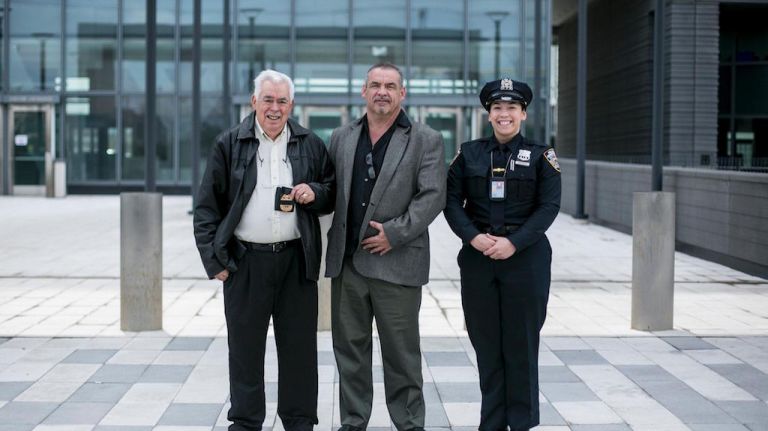 Retired NYPD Sgt. James Andrade Sr., retired NYPD Det, James Andrade Jr. and NYPD Trainee Marina Andrade outside the New York Police Academy in College Point, Queens, on March 31, 2016. Marina is the third generation of NYPD members in her family.