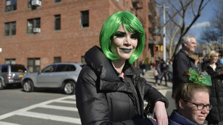 Maggie Downs with her sister, Kathleen, on Skillman Avenue near 49th Street during the St. Pat's for All Parade Sunday, March 6, 2016.