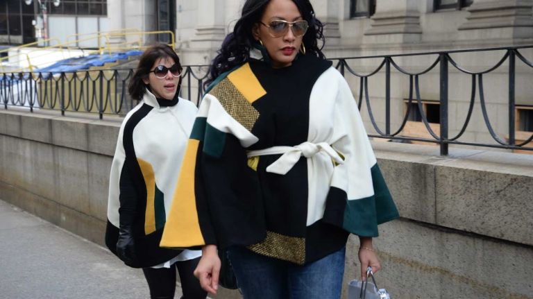 Women attend New York Fashion Week on Feb. 11, 2016.