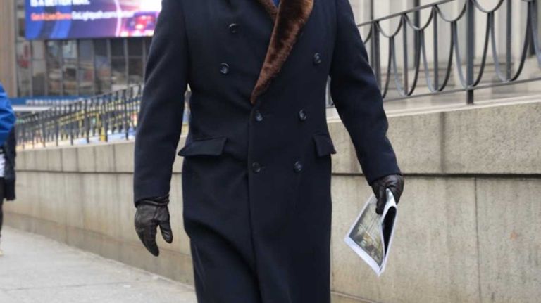 A man attends New York Fashion Week on Feb. 11, 2016.