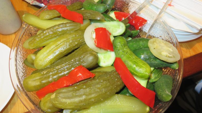 Carnegie Deli reopens: 'Finest pastrami sandwich in New York,' de Blasio says 12 Both half-sour and full-sour pickles are made at the Carnegie and come with every sandwich. Of course.