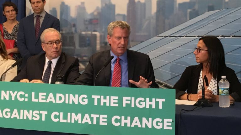 New York City pension funds investing $4B in green initiatives 1 City pensions' expanded investment in green initiatives is announced by Comptroller Scott Stringer, left, and Mayor Bill de Blasio, center, on Thursday.