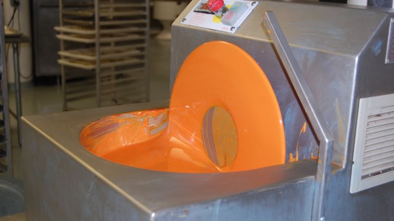 In the chocolate factory, chocolate swirled in every color. 