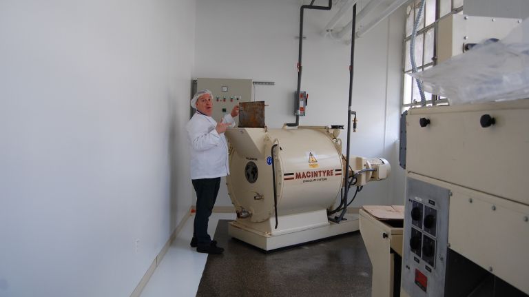 Torres (and all members of the tour) stuck their hairnet-covered heads into this machine. 