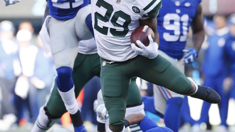 Bilal Powell #29 of the New York Jets runs with the ball against the New York Giants at MetLife Stadium on Sunday, Dec. 6, 2015 in East Rutherford, N.J.