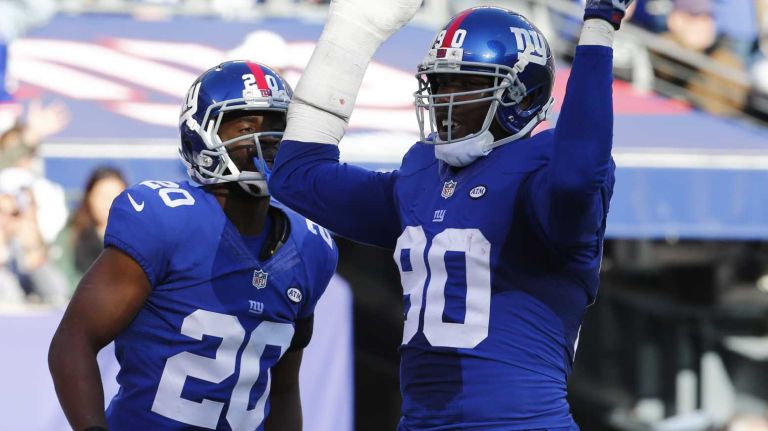 Jason Pierre-Paul #90 of the New York Giants celebrates after recovering a fumble against the New York Jets at MetLife Stadium on Dec. 6. 2015 in East Rutherford, N.J.