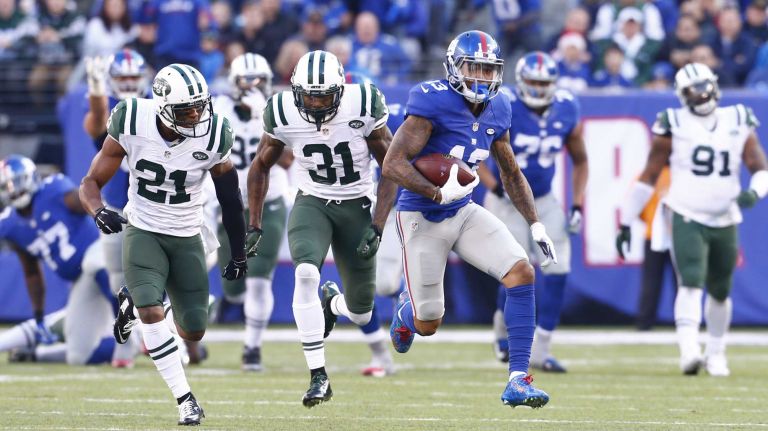 Odell Beckham #13 of the New York Giants runs with the ball after the catch for a touchdown against the New York Jets at MetLife Stadium on Dec. 6, 2015 in East Rutherford, N.J.