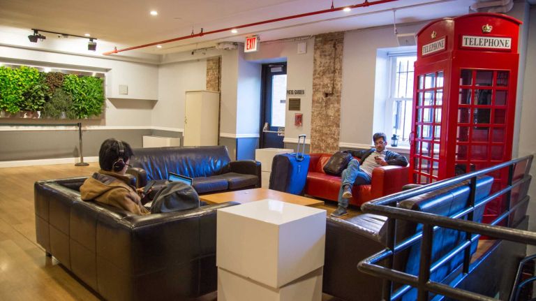 Travelling guests relax in on of the common areas at the HI NYC hostel at 891 Amsterdam Ave. on Nov. 23, 2015.