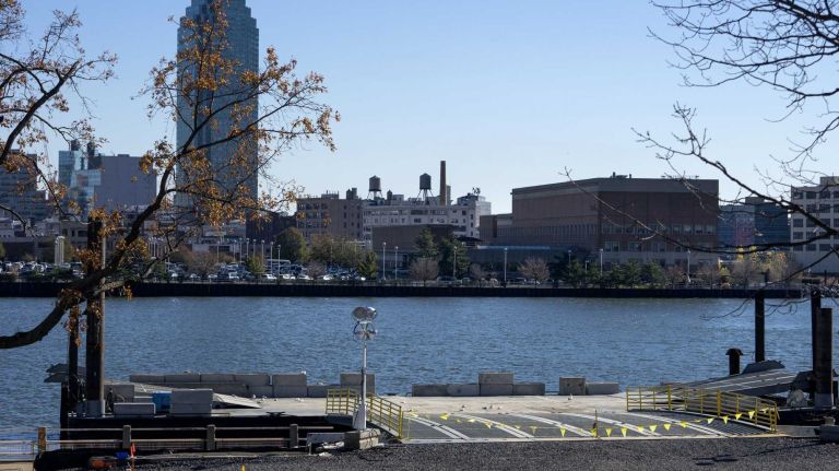 A floating ramp is seen south of the Ed Koch Bridge on Roosevelt Island (East Side), Tuesday, Nov. 17, 2105, a key component of the Cornell Tech construction project, where trucks arriving to the site by barge greatly reduce truck traffic on the island. Development of the first phase of the campus is currently underway and due to open in 2017. A tour of the project included views of steel and other materials rising for each building as part of phase one, The Bloomberg Center, named in honor of Emma and Georgina Bloomberg, The Bridge, where companies will locate on campus, and a residential building for faculty, staff and students, which will be the first Passive House residential high-rise in the world.