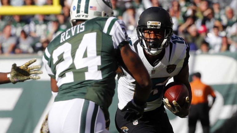 Allen Robinson #15 of the Jacksonville Jaguars runs a reception in the first half against Darrelle Revis #24 of the New York Jets at MetLife Stadium on Sunday, Nov. 8, 2015 in East Rutherford, New Jersey.