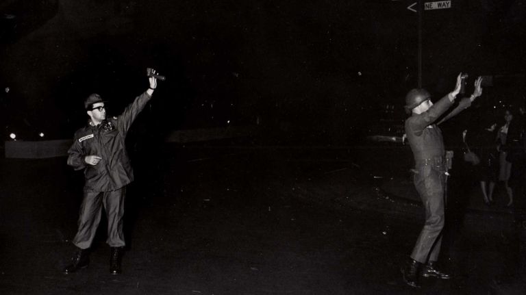 National Guardsmen from the 42nd (Rainbow) Division direct traffic at the intersection of 32nd Street and Park Avenue during the blackout on November 9, 1965.