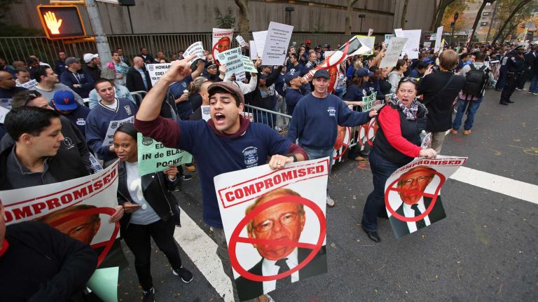 NYC Patrolmen's Benevolent Association members protest in Manhattan over a proposed 1 percent raise on Thursday, Nov. 5, 2015.