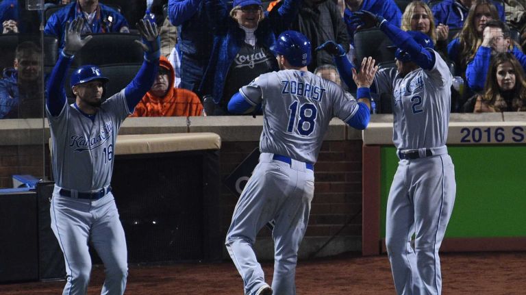 World Series Game 5: Mets vs. Royals 100 Kansas City Royals rightfielder Paulo Orlando, Royals second baseman Ben Zobrist and Royals shortstop Alcides Escobar celebrate after they score during the 12h inning of Game 5 of the World Series against the New York Mets at Citi Field on Sunday, Nov. 1, 2015.