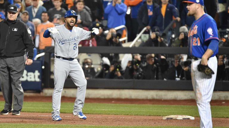 World Series Game 5: Mets vs. Royals 104 Kansas City Royals shortstop Christian Colon (24) reacts after his RBI single in the 12th inning during Game 5 of the World Series against the Kansas City Royals at Citi Field on Sunday, Nov. 1, 2015.