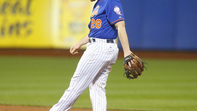 World Series Game 5: Mets vs. Royals 109 New York Mets second baseman Daniel Murphy (28) makes an error in the 12th inning during Game 5 of the World Series against the Kansas City Royals at Citi Field on Sunday, Nov. 1, 2015.
