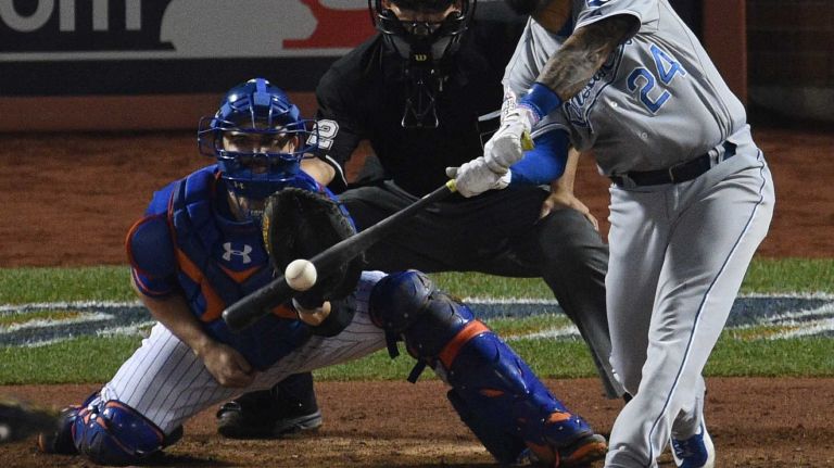 World Series Game 5: Mets vs. Royals 112 Kansas City Royals shortstop Christian Colon hits an RBI single against the New York Mets during the 12th inning of Game 5 of the World Series at Citi Field on Sunday, Nov. 1, 2015.
