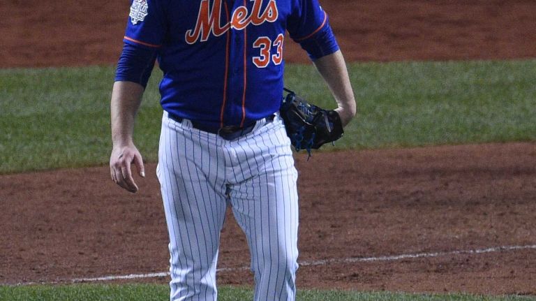World Series Game 5: Mets vs. Royals 130 New York Mets starting pitcher Matt Harvey watches an RBI double by Kansas City Royals first baseman Eric Hosmer during the ninth inning of Game 5 of the World Series at Citi Field on Sunday, Nov. 1, 2015.