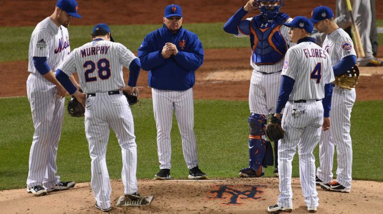 New York Mets manager Terry Collins stands on the pitcher's mound after taking out Mets starting pitcher Steven Matz during the sixth inning in Game 4 of the World Series against the Kansas City Royals at Citi Field on Saturday, Oct. 31, 2015.