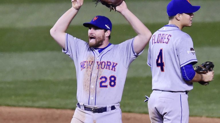 NLCS Game 3: Mets vs. Cubs 35 New York Mets second baseman Daniel Murphy (28) celebrates the win during Game 3 of the NLCS against the Chicago Cubs at Wrigley Field on Tuesday, Oct. 20, 2015.