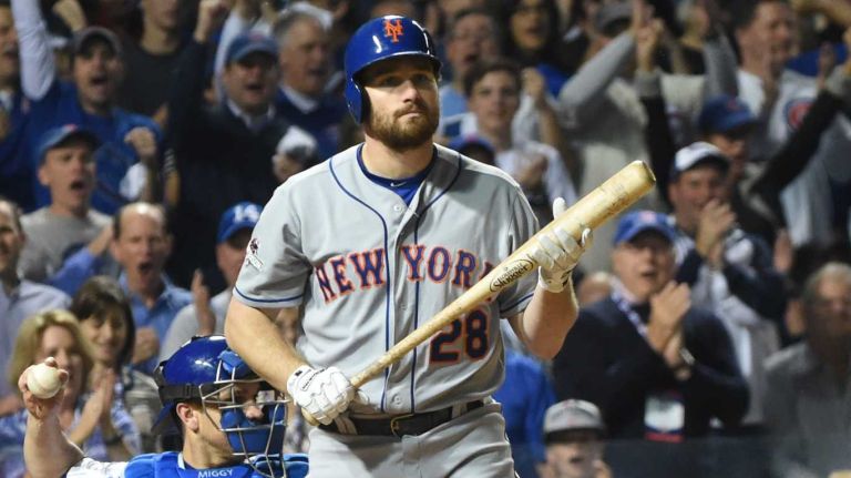 NLCS Game 3: Mets vs. Cubs 57 New York Mets second baseman Daniel Murphy (28) reacts after he strikes out in the first inning during Game 3 of the NLCS against the Chicago Cubs at Wrigley Field on Tuesday, Oct. 20, 2015.